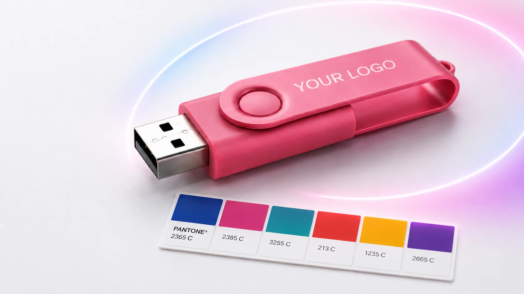 Pantone matched pink twister USB drive printed with your logo beside a Pantone colour swatch strip