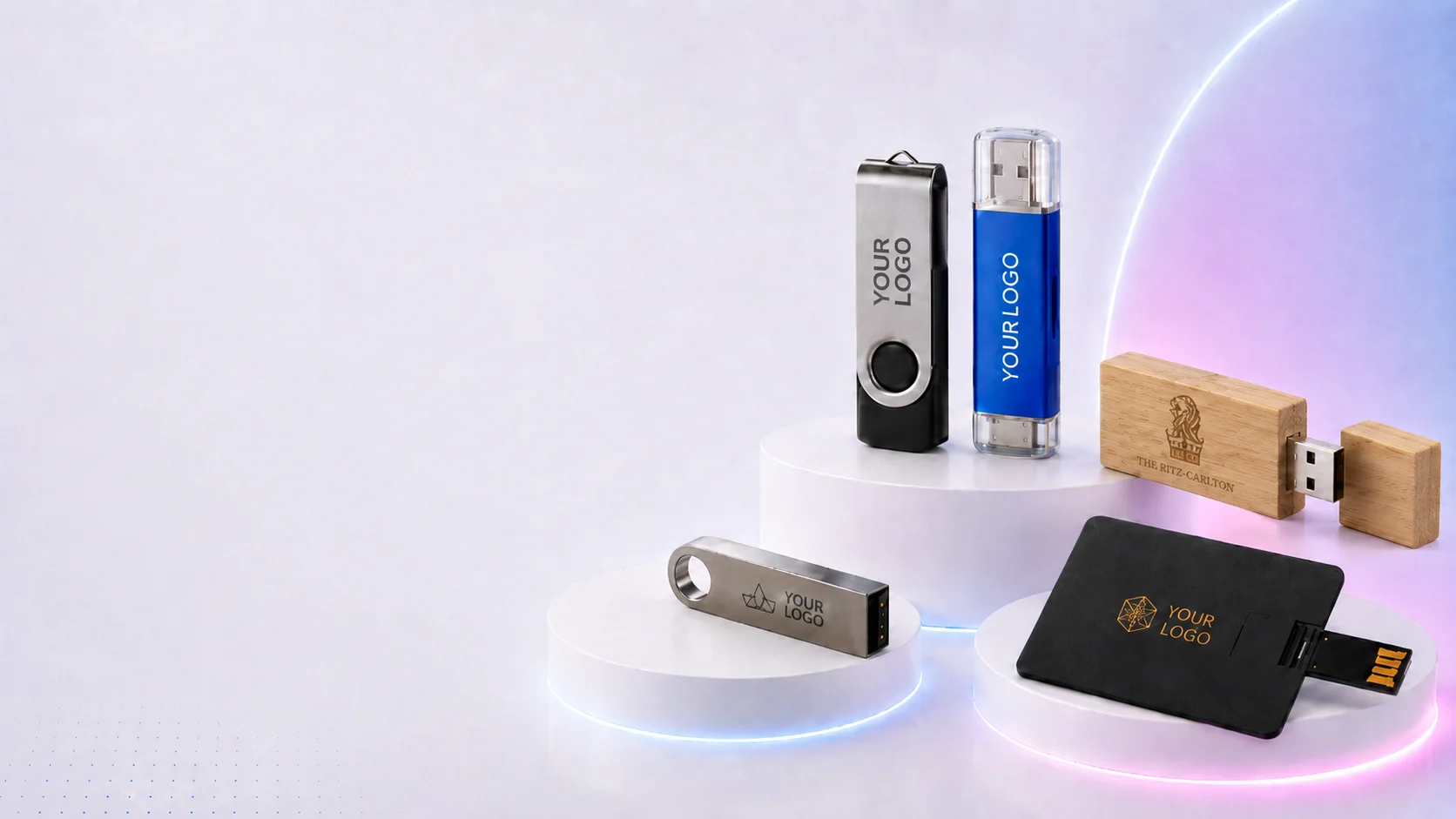 Branded USB sticks with custom logos on lit podiums - swivel, metal, wood and card styles
